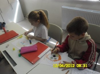 1st Graders are preparing their creative CLOWN MASKS